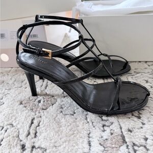 KHAITE Black Patent Strappy Stiletto Cage Sandals
